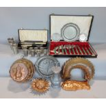 A mixed collection of metalware and silver plate to include copper jelly moulds, a pewter lidded