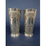Good pair of Victorian tall beakers, decorated in relief with scrolled foliage and further faceted