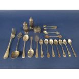 A mixed collection of silver to include a pair of silver baluster peppers and various other flatware