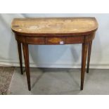 A Georgian mahogany demi-lune fold over top card table with satinwood banding and other inlaid