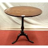 A small Georgian mahogany snaptop occasional table on turned pillar and tripod, the top 60cm