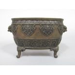 Meiji period Japanese bronze censer of oval form, with a band of shaped relief work panels of