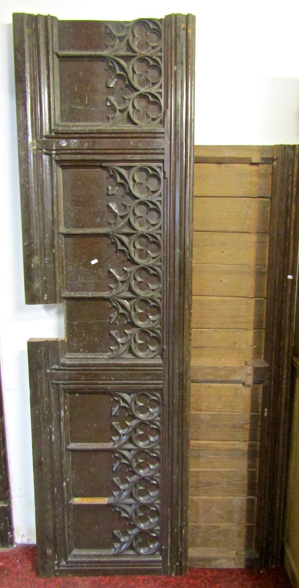 Three reclaimed stained pine runs of ecclesiastical panelling, two with Gothic tracery and moulded - Image 2 of 2