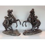 Pair of cast spelter studies of the Marley Horsman, inscribed Coustou, each 44 cm high (2)