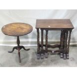 A nest of three good quality reproduction Old English style oak occasional tables, raised on