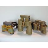 Three pairs of binoculars to include Russian 6x30, Eyeskey 8x30 and 10x30, all with straps and