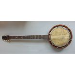 A cased rosewood banjo