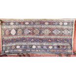 Kelim rug with various medallions upon a multi-coloured ground dated 1953, 220 x 170 cm together