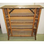 A unusual late Victorian bamboo freestanding open bookcase with three adjustable shelves, raised