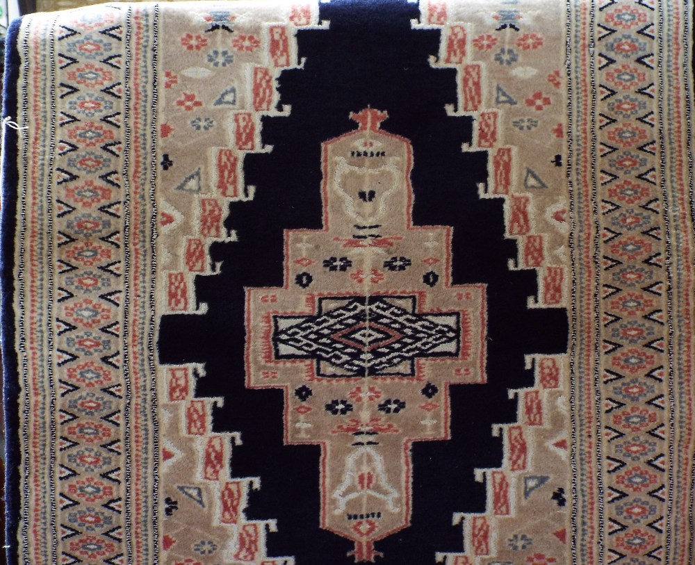 Keshan runner with central ivory medallions upon a navy blue ground 400 x 80 cm - Image 2 of 2