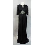 Edwardian evening gown in black silk with sage green panelled inserts which are beaded, overlaid