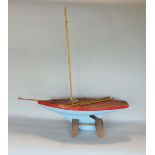 A small vintage wooden pond yacht with blue painted hull, 66cm (max length)