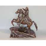 Cast bronze character group of a cavalier type gentleman on horseback with a snake at their feet,