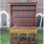 Small Georgian cottage potboard dresser, the lower section enclosed by three frieze drawers over