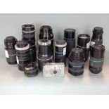 A box containing a large quantity of camera lenses (14)