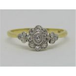 Attractive 18ct diamond cluster ring of flower head form, with further trefoil clusters to each