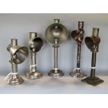 A collection of five various white metal candle/student lamps all with shades (5)