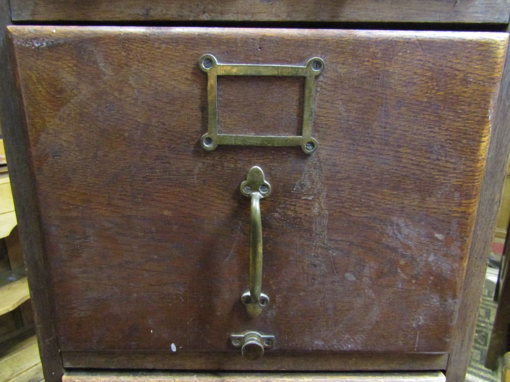 An Edwardian oak floor standing office filing cabinet, fitted with an unusual arrangement of two - Image 3 of 3