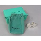Pair of silver Tiffany style cufflinks stamped 'Tiffany & Co.', with pouch and box
