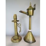 A Dutch brass drip spout lamp together with a further Palmer & Co spring candle lamp (2)