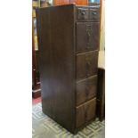 An Edwardian oak floor standing office filing cabinet, fitted with an unusual arrangement of two