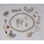 Collection of silver / white metal jewellery to include a Scandinavian spiral link necklace,