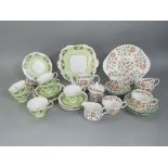 A collection of Minton Haddon Hall pattern wares comprising small teapot, cake plate, milk jug,