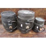 Three rustic rural farm workers' cider barrels, with steel bands and loop handles