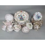 A collection of 19th century pink lustred teawares comprising teapot, pair of cake plates, milk jug,