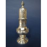 Early George III silver caster with scrolled acorn finial and pierced diaper work top, maker