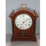 Edwardian walnut boardroom clock, the 8 inch enamel dial fitted with Roman numerals, flaked by brass