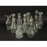 A collection of nine 19th century and later decanters to include a pair of hob nail cut decanters