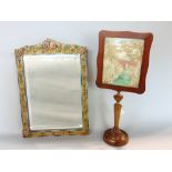 A good Barbola wall mirror with bevelled glass, with typical floral decoration, 45cm high;