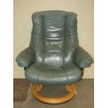 A Ekornes Stressless swivel and adjustable lounge chair with soft green leather upholstery, together