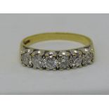 18ct six stone diamond half hoop ring, each stone 0.20cts approx, size U, 4.6g