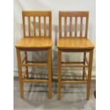 Two pairs of high chair back stools in varying design, one pair with polished tubular supports (4)