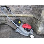 A Honda HRB476C petrol driven rotary lawn mower with moulded plastic deck