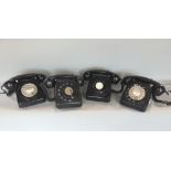 A basket containing four vintage BT GPO black telephones (4)