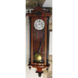 Biedermeier Vienna wall clock, with ebonised and fruitwood case, twin train enamel dial and