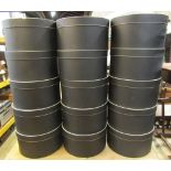 Fifteen cylindrical hat boxes 39 cm in diameter (black colourway with cream trim and lettering)