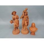 A pair of late 19th century terracotta figures of a fisherman and his child and a fisherwoman with