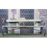 A sprung steel garden bench with green painted timber lathes, 6ft long approx, together with one