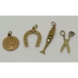 Three 9ct charms comprising horseshoe, St Christopher and an articulated fish (fish af), 6.6g total,
