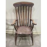 A Victorian stained elm and beechwood Windsor lathe back armchair together with a shallow stained