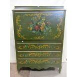 A continental side cabinet with all over decorative hand painted floral detail on a green ground,