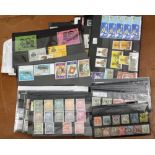 A box containing a collection of commonwealth and empire GB stamps on cards, (1)
