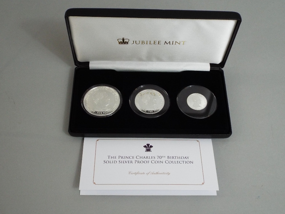 HRH Prince Charles 70th Birthday Heritage coin and stamp set 54/499 and silver proof coin set £5, £2 - Image 2 of 3