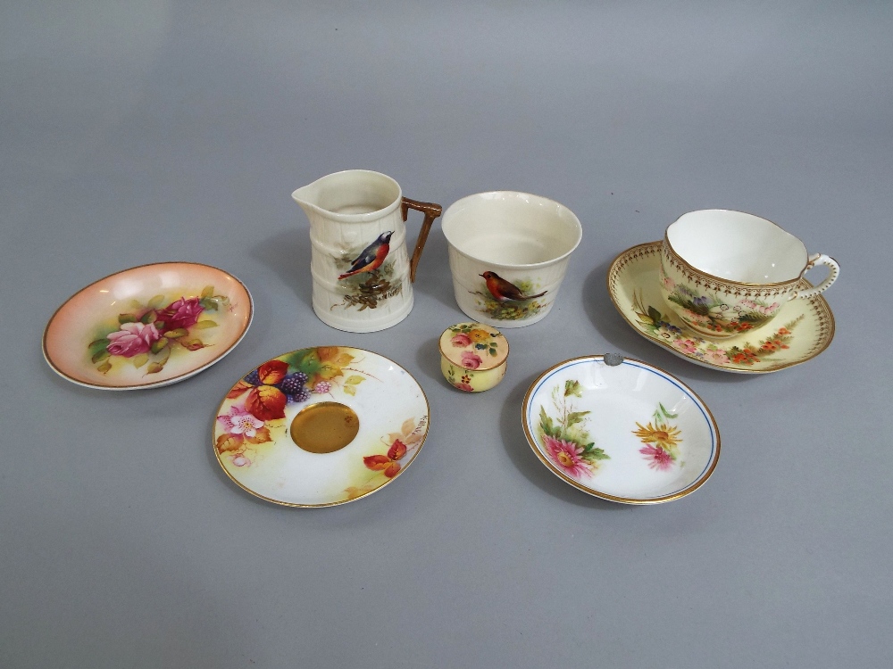 A collection of Royal Worcester wares including a coopered jug with painted decoration of a