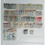 An accumulation of GB and World stamps in three stockbooks