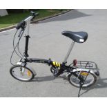 A Pyramid folding bicycle (appears hardly used)